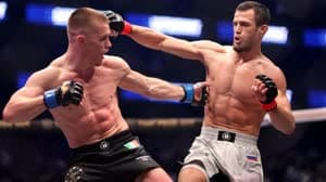 عثمان نورماغوميدوف وبول هيوز