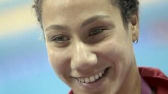 فريدة تحرز ذهبية 100 متر حرة