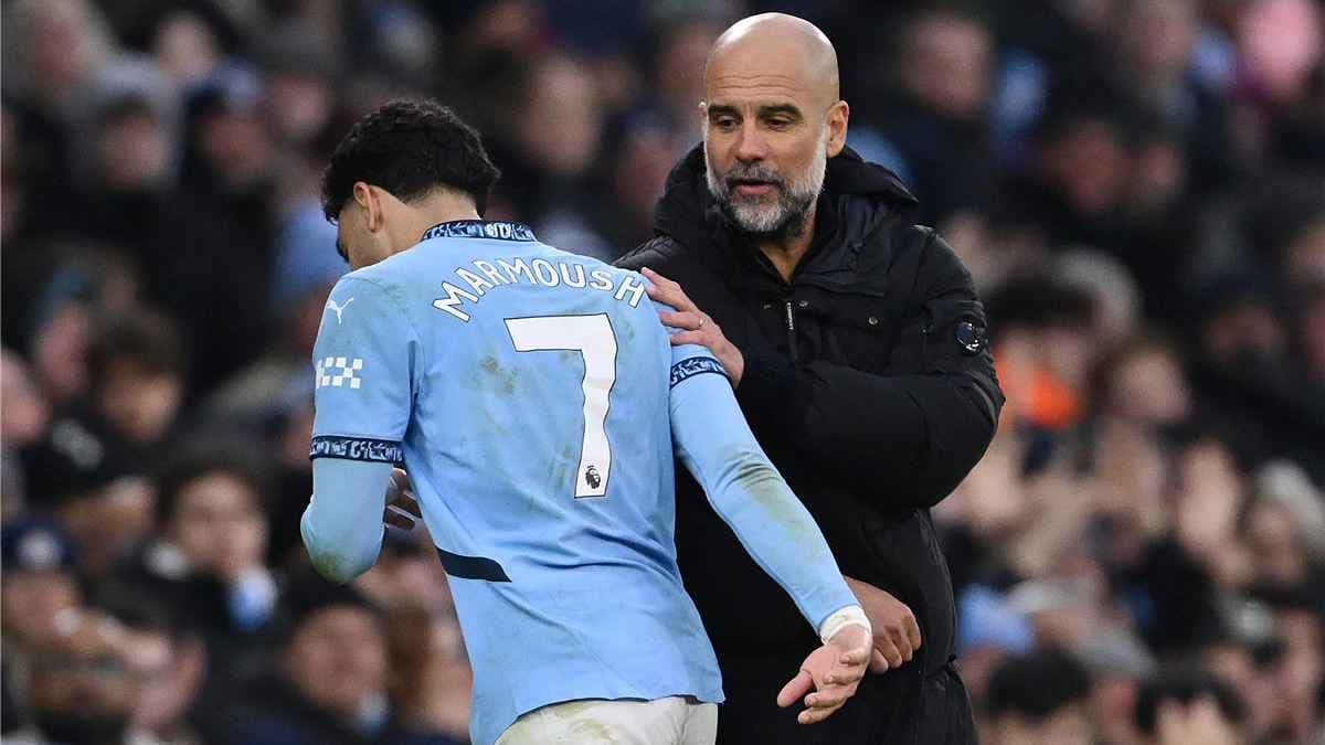 بيب غوارديولا مع عمر مرموش